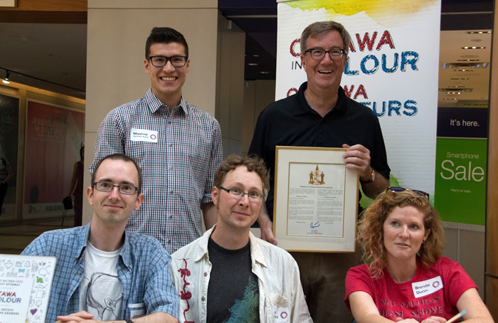 Mayor Jim Watson presenting the plaque